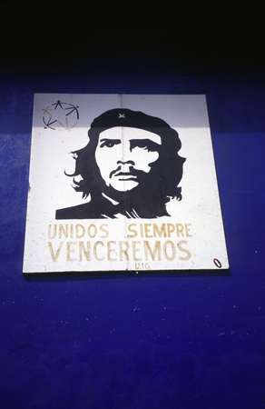 photo of Cuba, billboard of the hero of the Cuban revolution Che Guevara : 'Unidos siempre venceremos' (united we will always win)