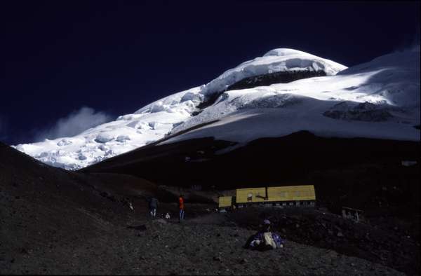 photo of Ecuador, Andes, Cotopaxi volcano, the snowy summit (5897 m) and mountain refuge (shelter, hut at 4800 m)