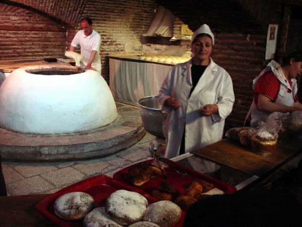 photo of Republic of Georgia, Tbilisi, making traditional Georgian bread in the old way, bakery close to the sulphur baths