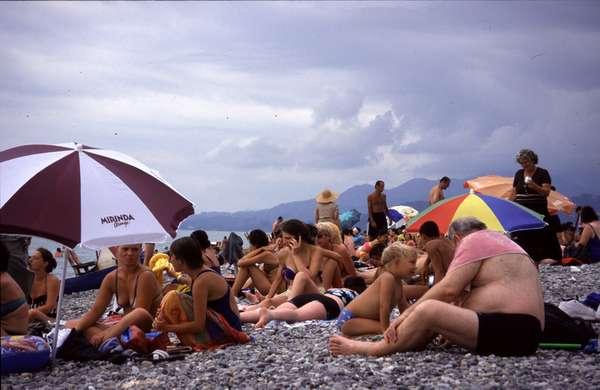 photo of Republic of Georgia, Georgians sunbathing on the stone beach of Batumi, the biggest Georgian Black Sea resort town