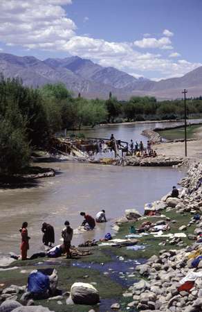 photo of India, Ladakh, around Leh, villagers washing clothes in a river