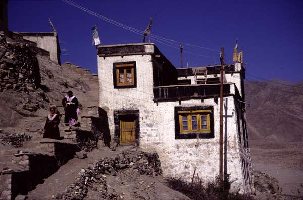 photo of India, Ladakh, houses and two women