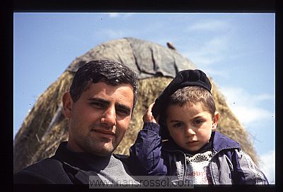 photo of Nagorno Karabakh, Karabakhi father and son with hay tower