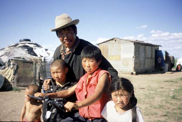 photo of Central Mongolia, Mongolian man with children