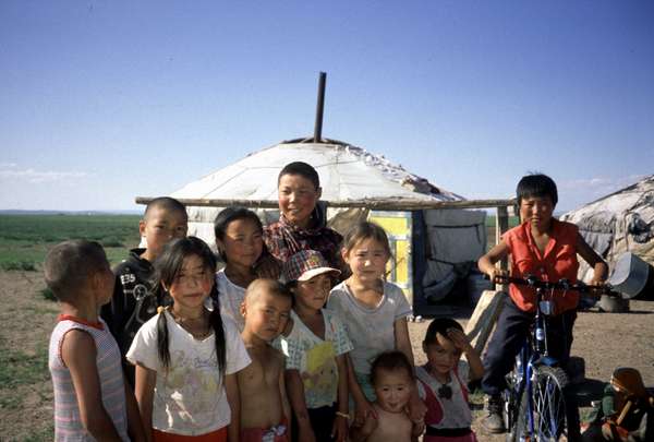 photo of central Mongolia, Mongolian kids in front of yurt camp