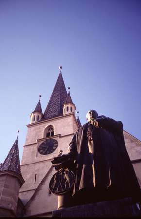 photo of Romania, Transylvania, Sibiu Medieval Centre, Plaza Mare (Big Square), view on statue and church