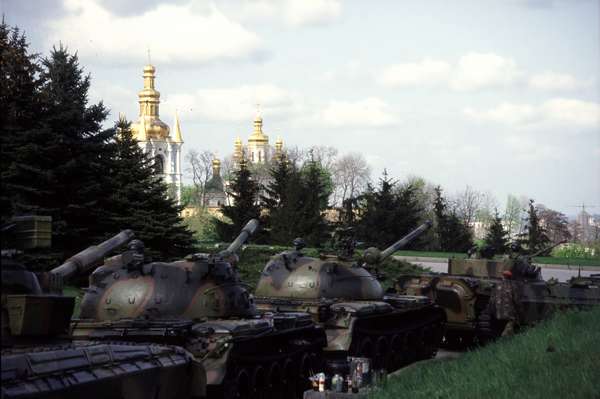 photo of Ukraine, Kiev (Kyiv), army tanks from the Great Patriotic War Museum and some church towers of the of the Caves Monastery (Pecherska Lavra)
