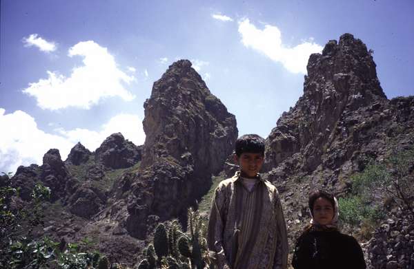 photo of Northern Yemen, Haraz Mountains, mountain village near Manakha, Yemeni children on a path between cactusses and rocks