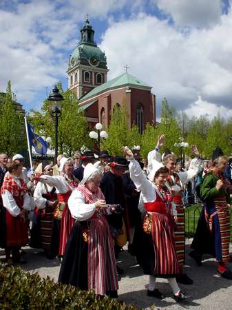 photo of Sweden, Stockholm, celebration of people from Hälsingland in traditional Swedish costume; some of them walked al the way the 500 km from Hälsingland, a traditional farming region in Central Sweden