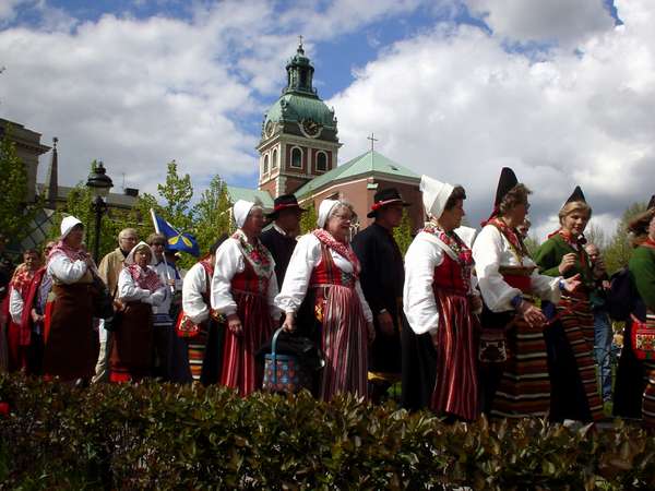 photo of Sweden, Stockholm, celebration of people from Hälsingland in traditional Swedish dress (folkdräkt); some of them walked the 500 km from Hälsingland, a traditional farming region in Central Sweden