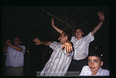 photo of Azerbaijan, Sheki, dancing on a wedding in the caravanserai of Sheki