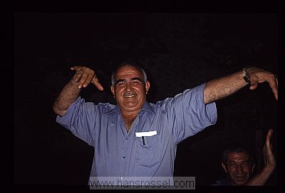 photo of Azerbaijan, Sheki, Azeri dancing on a wedding in the caravanserai of Sheki