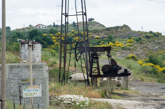 Albania photo around Fieri: Oil derrick, Petrol industry, Albanian Oil field. Albanian Ecology, environment, waste and pollution. 